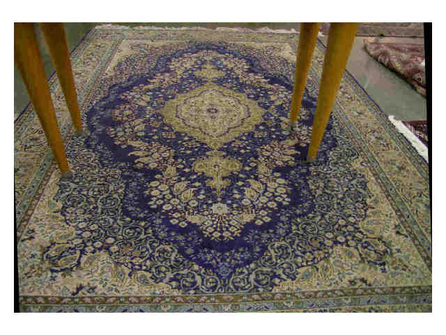 Appraisal: Oriental rug beige blue and sage ' x ' figural