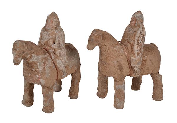 Appraisal: A CHINESE PAIR OF RIDERS ON HORSE-BACK HAN DYNASTY -