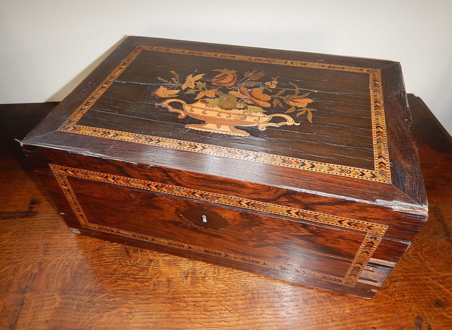 Appraisal: A Victorian inlaid rosewood writing slope with marquetry inlaid top