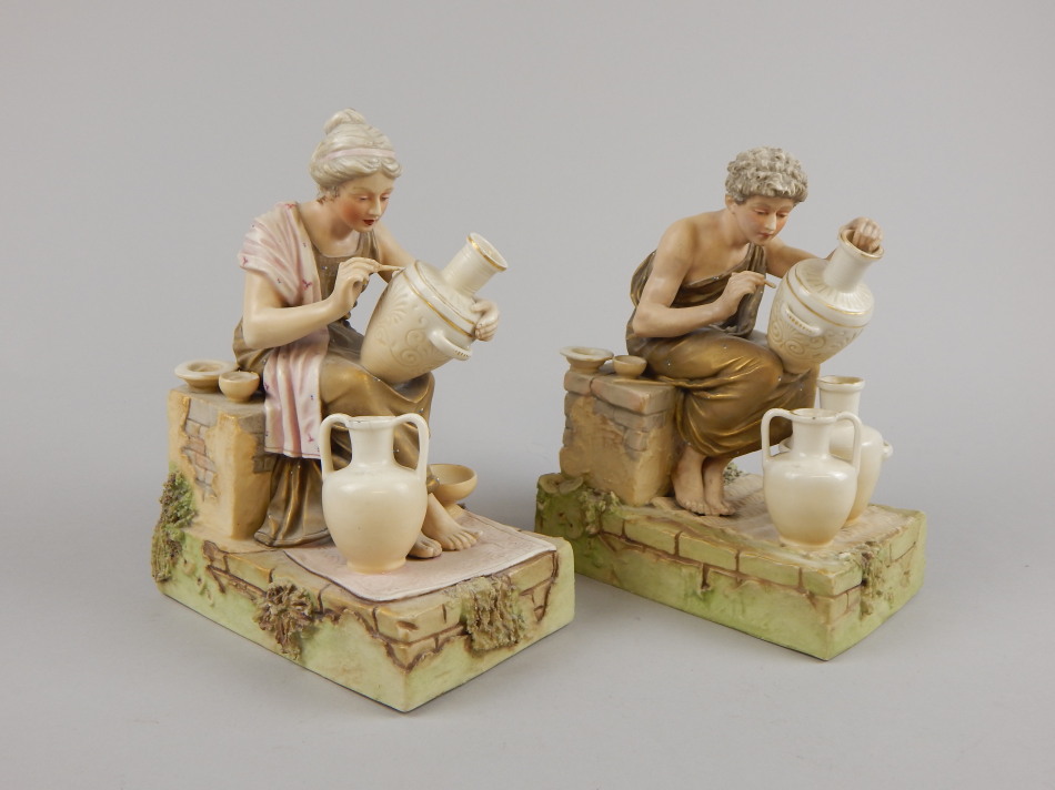 Appraisal: A pair of early thC Royal Dux figures of male