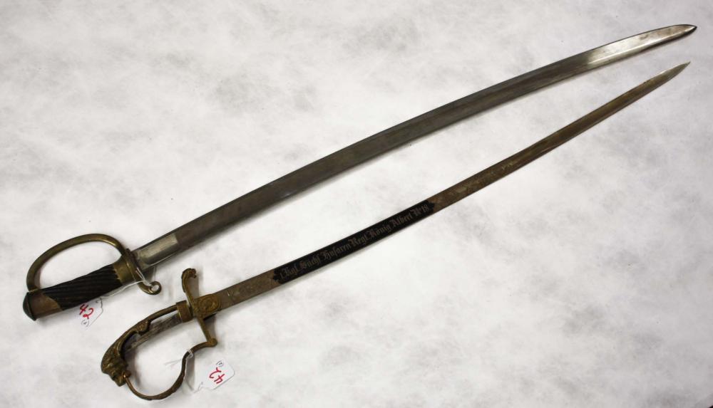 Appraisal: TWO COLLECTABLE SWORDS the first a Russian model Cossack shashka