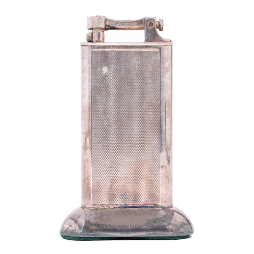 Appraisal: An Alfred Dunhill silver plated table lighter engine turned cm