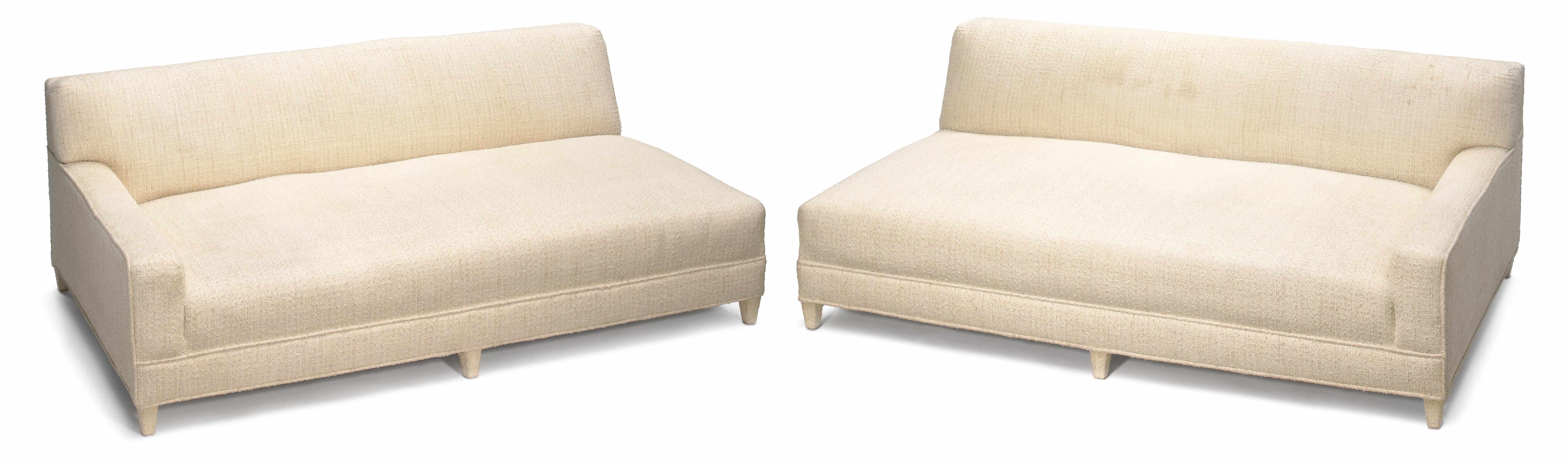 Appraisal: A pair of William Haines single arm sofas mid th