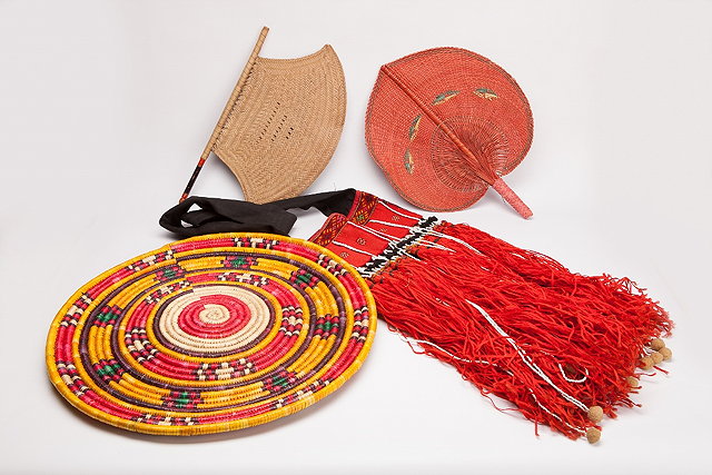 Appraisal: A SUDANESE SHOULDER BAG with polychrome diamond decoration and bead