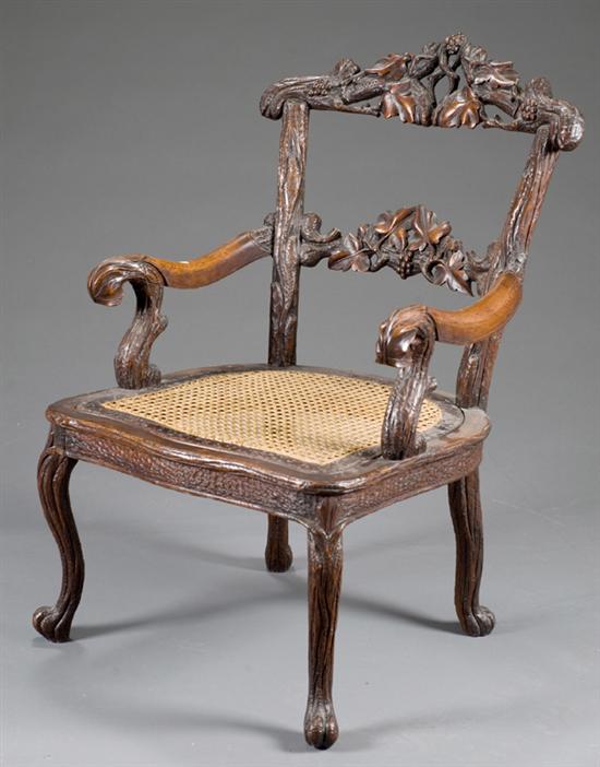 Appraisal: German black forest carved armchair nd half th century Thickly