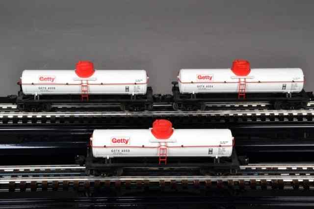 Appraisal: LIONEL GETTY DIE CAST TANK CARSIncluding three white with red