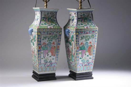 Appraisal: PAIR CHINESE FAMILLE ROSE PORCELAIN VASES Figural decoration electrified -