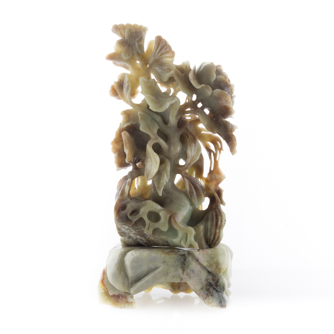 Appraisal: Chinese carved jade root stock with flowers in H with