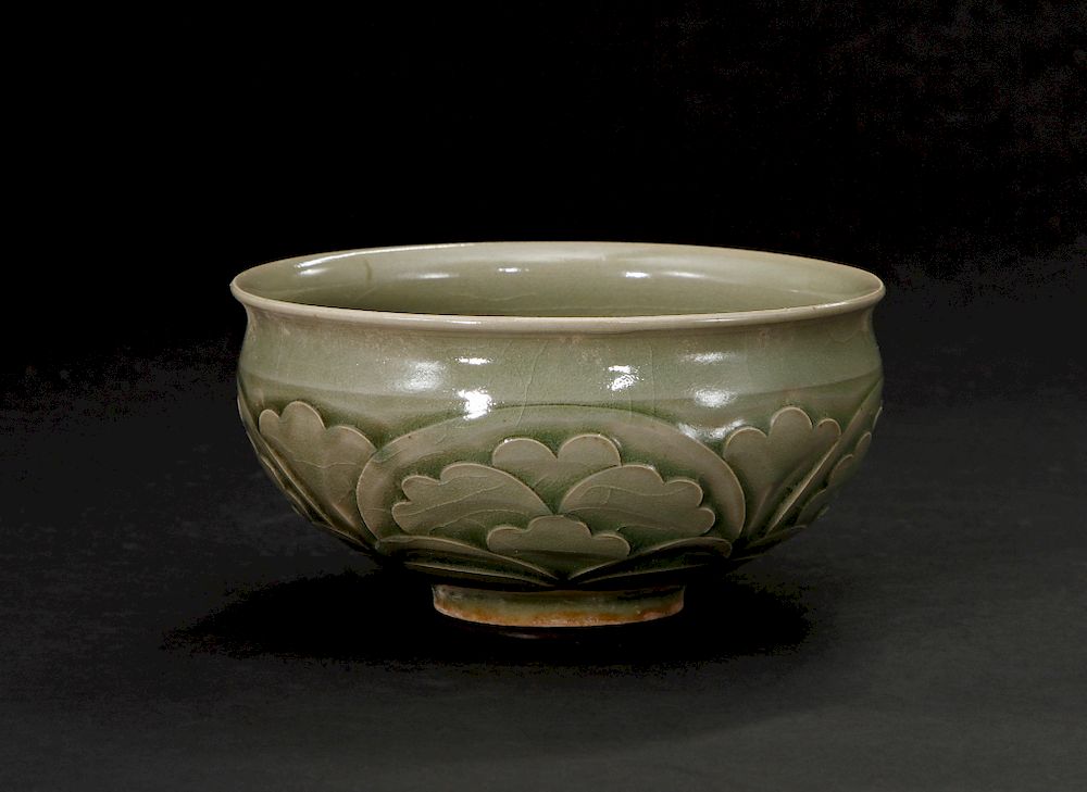 Appraisal: Carved Yaozhou Celadon 'Peony' Bowl Finely potted with rounded sides