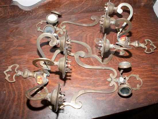 Appraisal: Pair of Continental three-light brass and mirrored sconces Estimate -