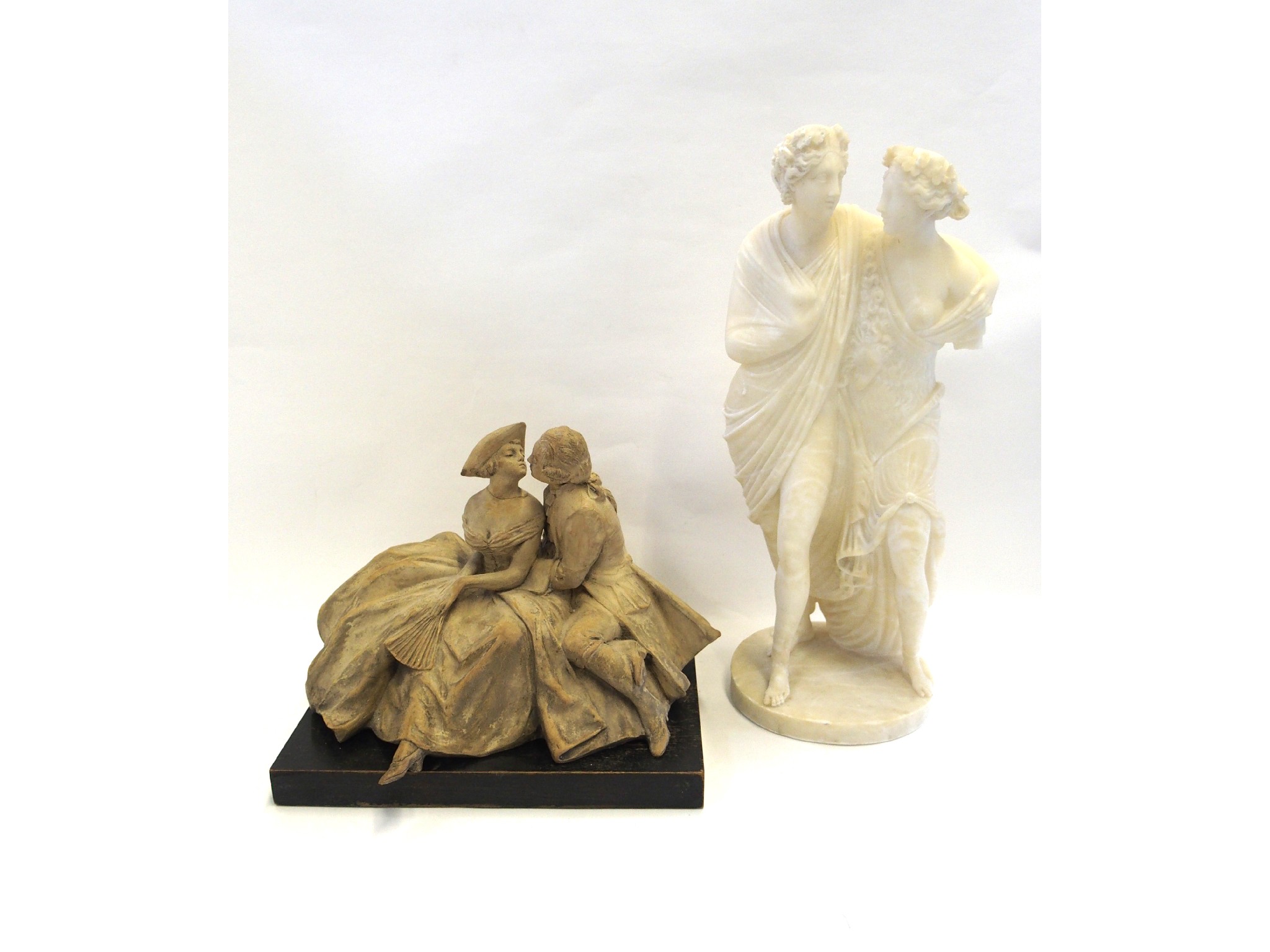 Appraisal: Ceramic group of a couple signed indistinctly to reverse and