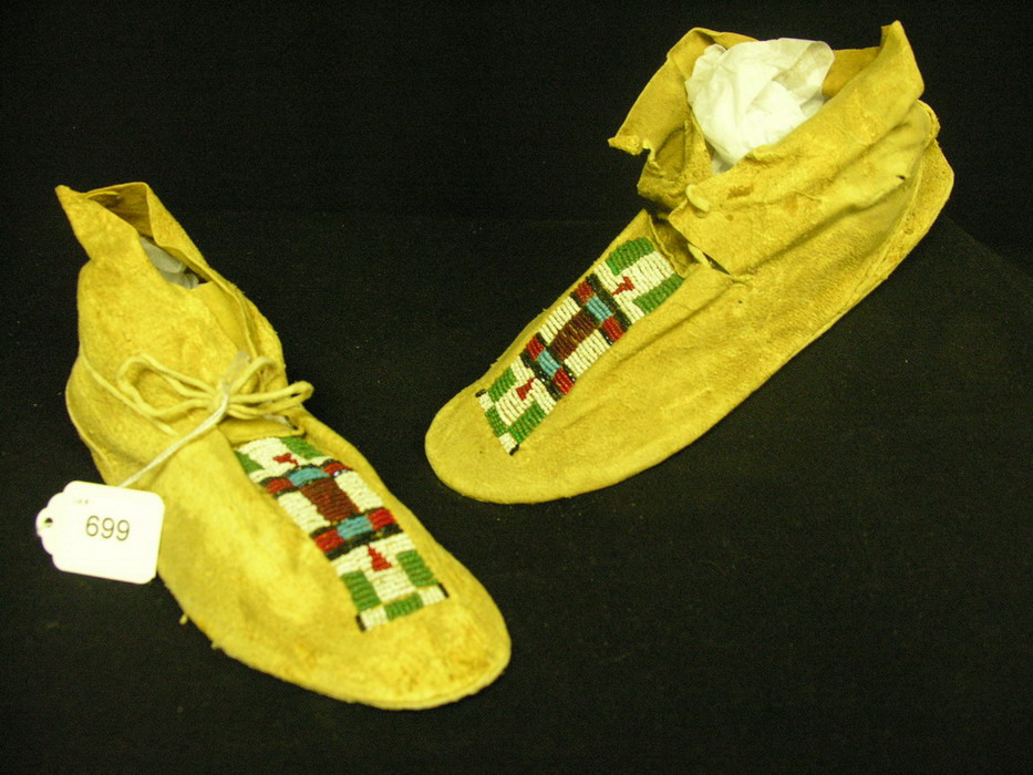 Appraisal: NATIVE AMERICAN BEADED MOCCASINS Hand sewn brain tanned leather with