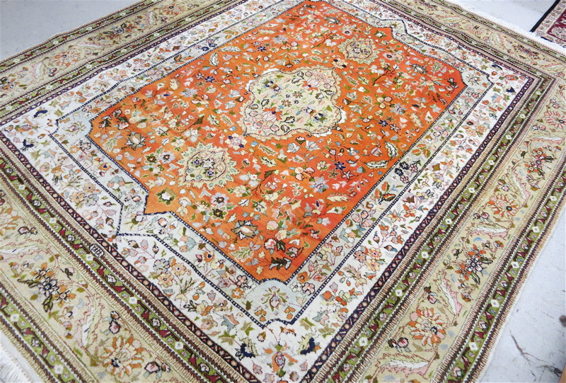 Appraisal: HAND KNOTTED PERSIAN CARPET Tabrize design of floral and central