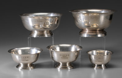 Appraisal: Five Sterling Dog Trophies American th century Revere style bowls