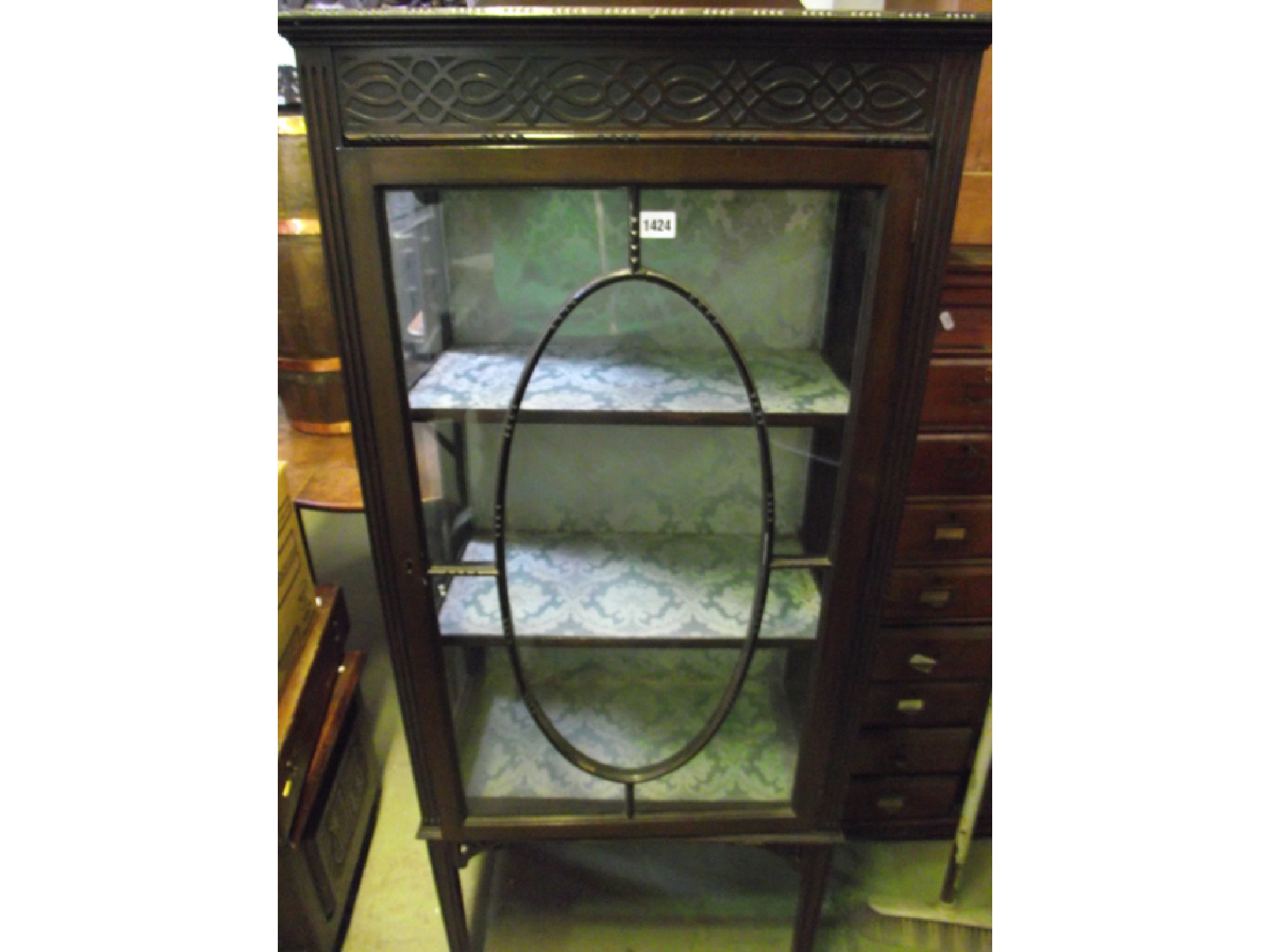 Appraisal: An Edwardian mahogany display cabinet with astragal glazed panelled door