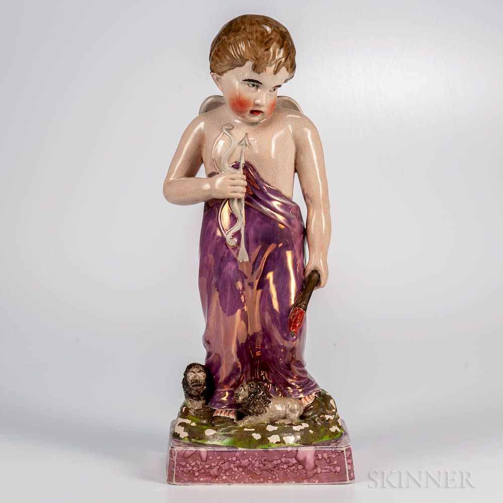 Appraisal: Large Pink Lustre Figure of a Cherub Large Pink Lustre