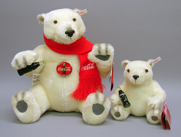 Appraisal: Pair of tagged white mohair Coca-Cola Polar Bears Cub Bear