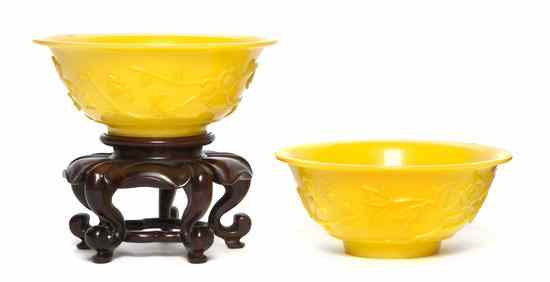 Appraisal: A Pair of Chinese Peking Glass Bowls in monochrome yellow