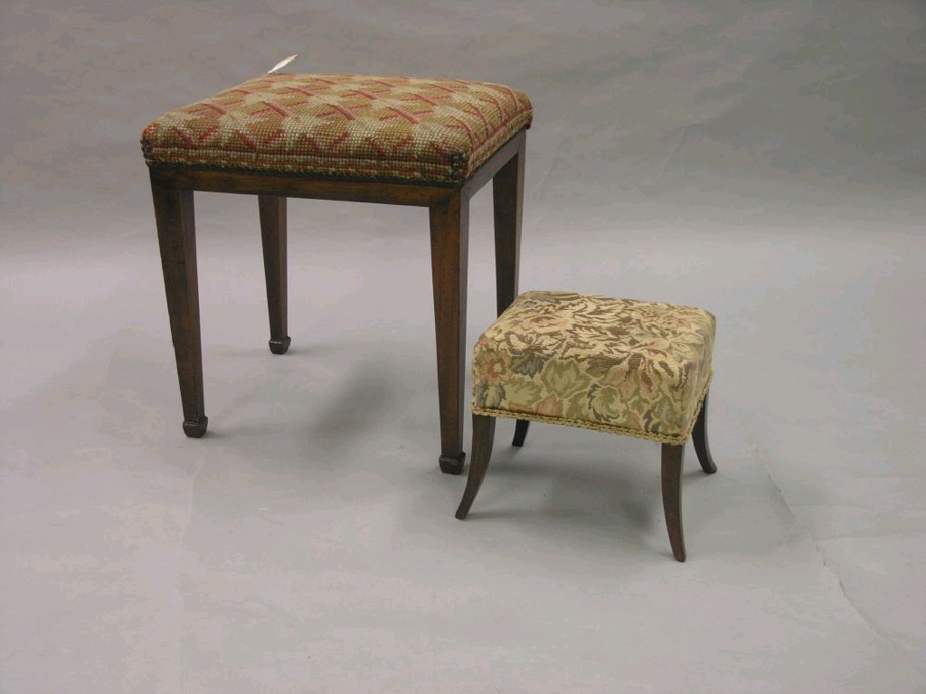 Appraisal: Two Victorian stools each with upholstered seat on mahogany frames