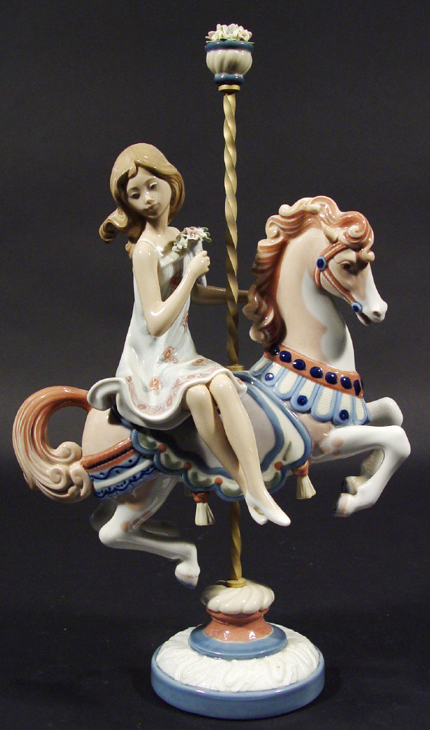 Appraisal: Large Lladro porcelain figurine on merry-go-round horseback with brass barleytwist