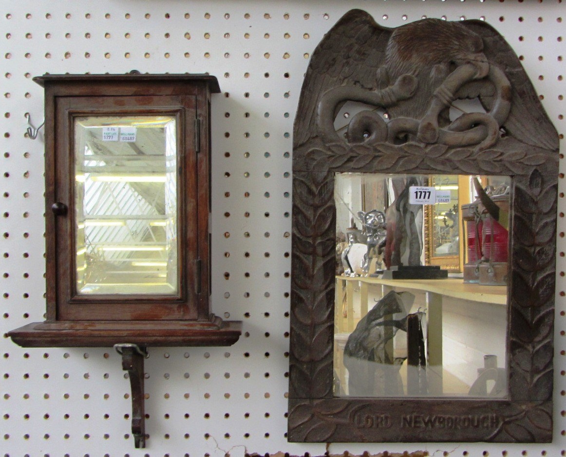 Appraisal: A carved oak wall mirror early th century with eagle