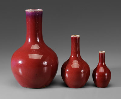 Appraisal: Three Copper-Red Porcelain Bottle Vases Chinese th century all with