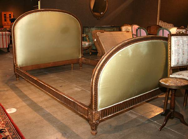 Appraisal: A Neoclassical style giltwood and upholstered bed th century height