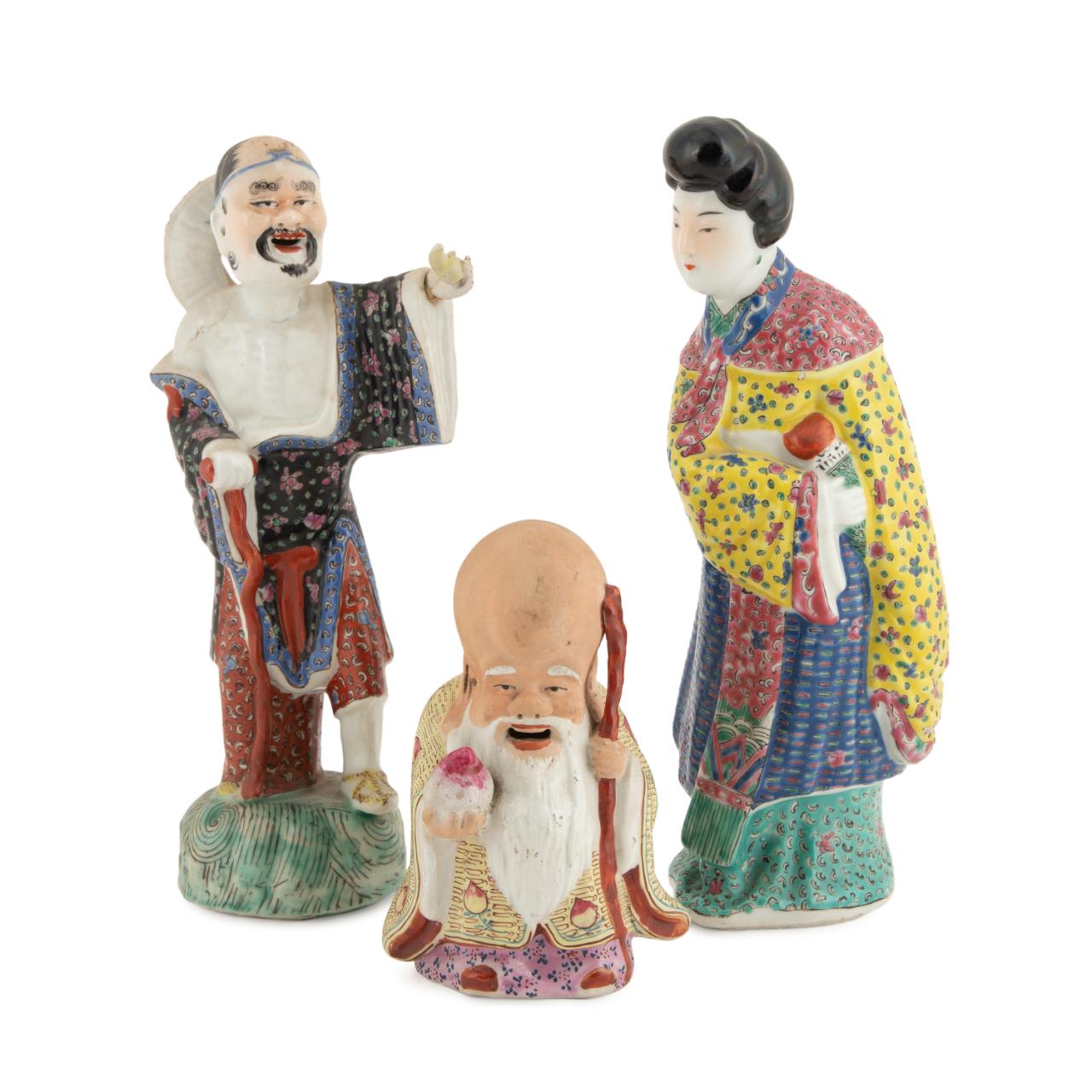 Appraisal: THREE CHINESE PORCELAIN DEITY FIGURINES Three Chinese porcelain deity figurines