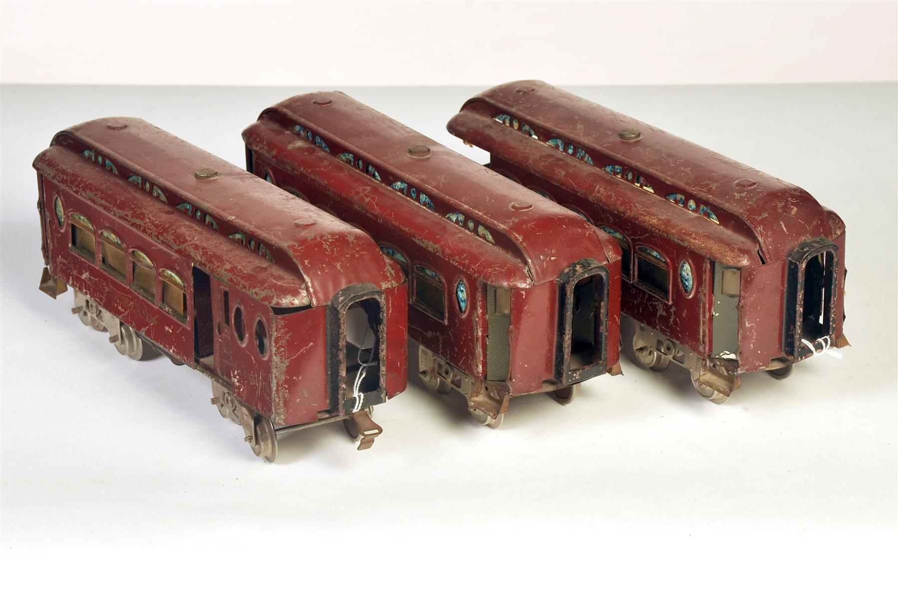 Appraisal: THREE EARLY LIONEL STANDARD GAUGE PASSENGER CARS INCLUDING A COMBINE