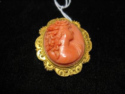 Appraisal: Coral cameo pin of a woman's dextral profile with flowers