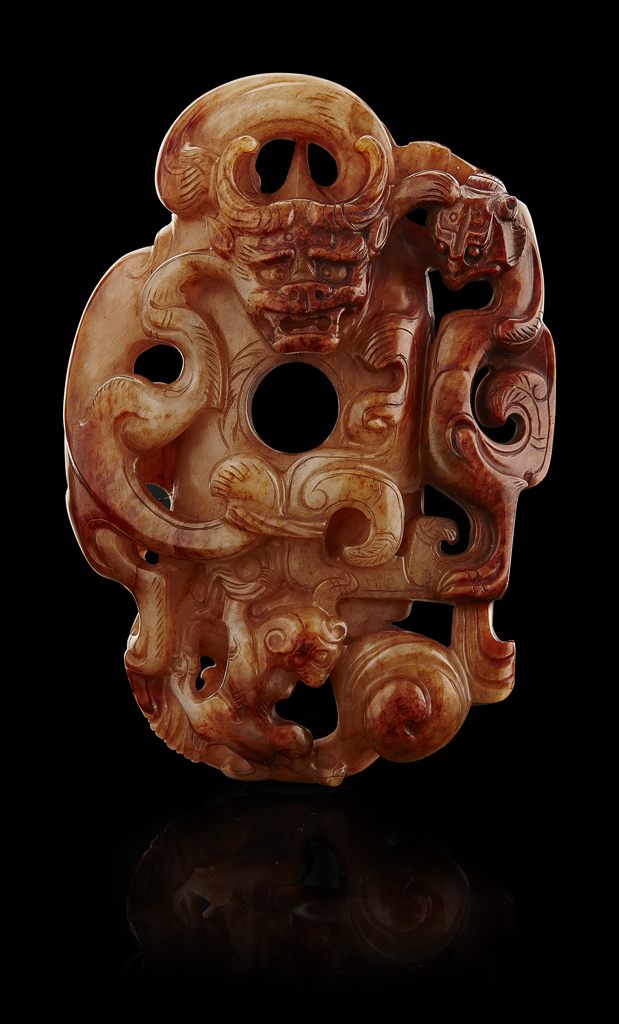 Appraisal: WHITE AND RUSSET JADE CARVED PLAQUE carved and pierced in