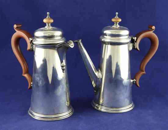 Appraisal: A pair of 's th century design silver cafe au