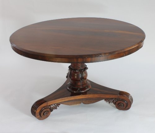 Appraisal: A Regency circular padouk wood breakfast table on turned stem