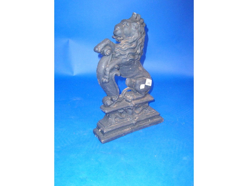 Appraisal: A cast metal doorstop modelled as a heraldic lion cm