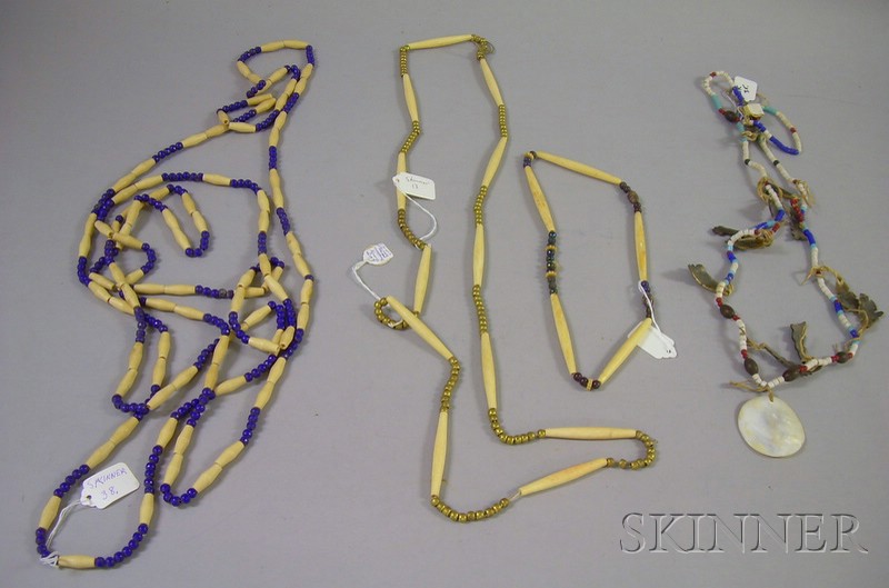 Appraisal: Four Native American Necklaces bone brass and glass beads lg