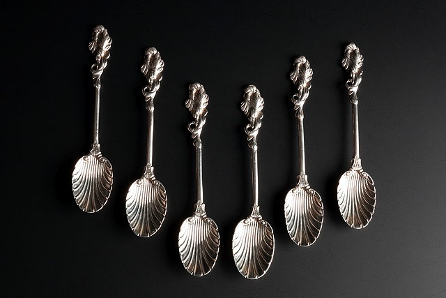 Appraisal: A SET OF SIX SILVER ROCOCO TEASPOONS with cast leaf