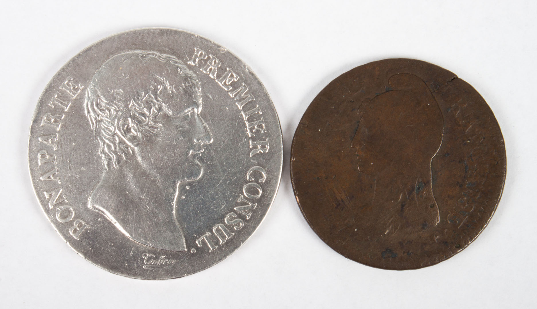 Appraisal: France two revolutionary-era coins comprising silver francs of Napoleon Premier