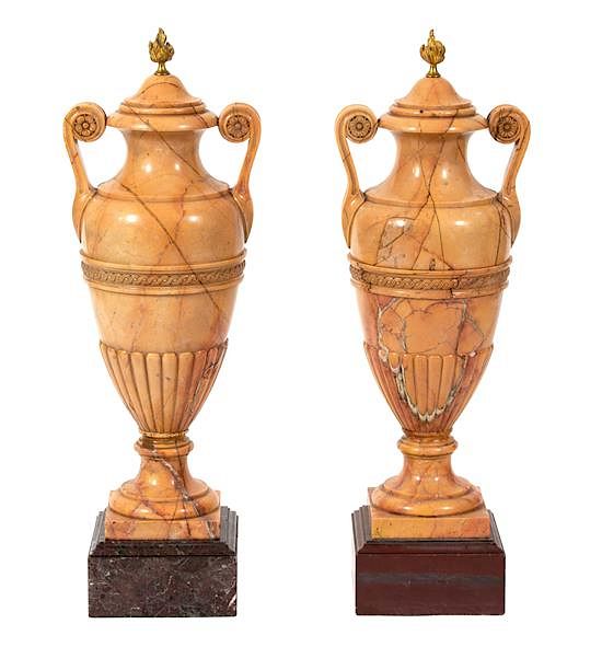 Appraisal: A Pair of Italian Crema Valencia Marble Double-Handled Urns Height