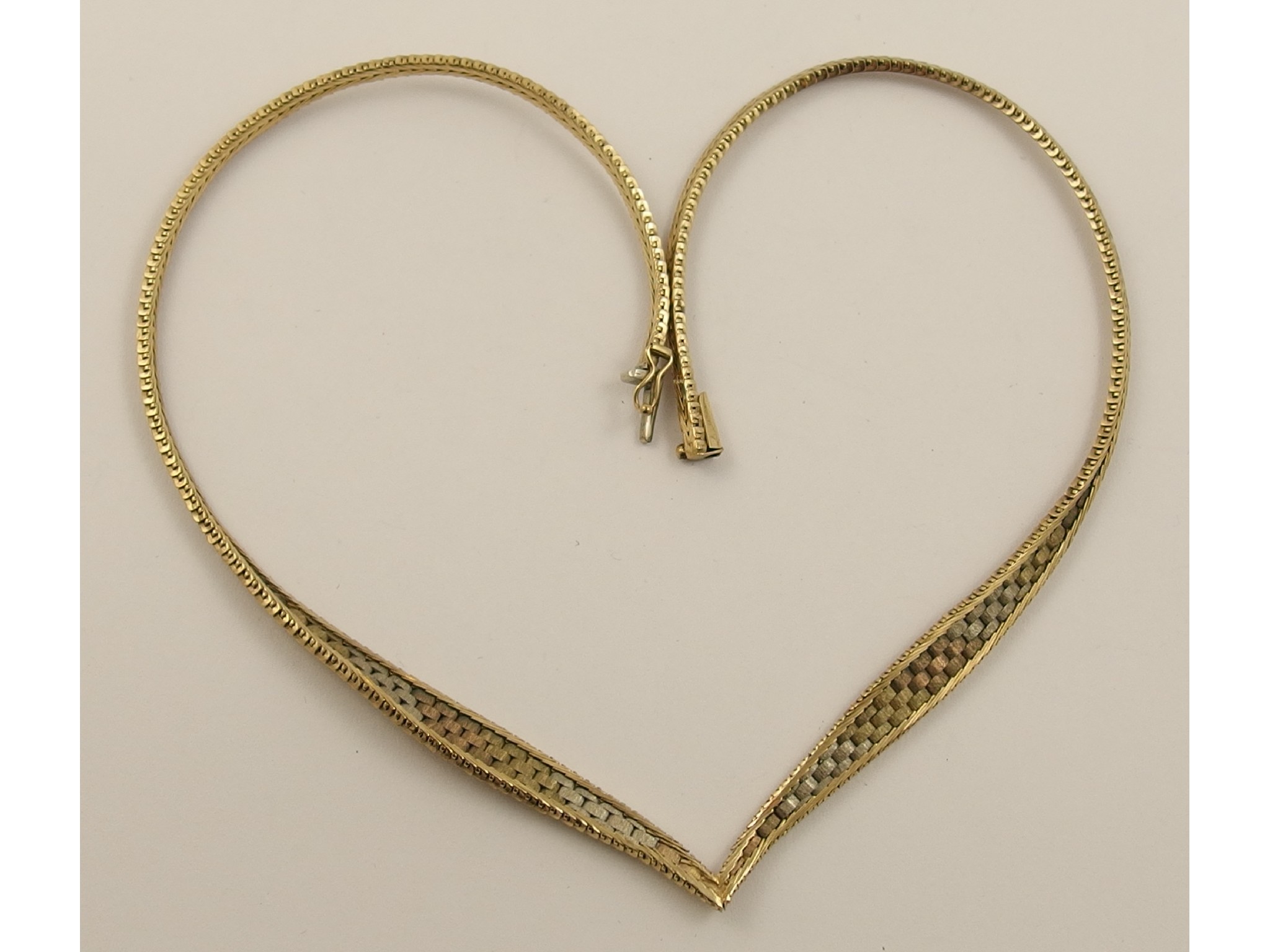 Appraisal: A ct herringbone style tricolour gold necklace