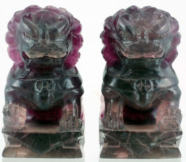 Appraisal: Pair of Chinese carved amethyst foo lions Marked under bases