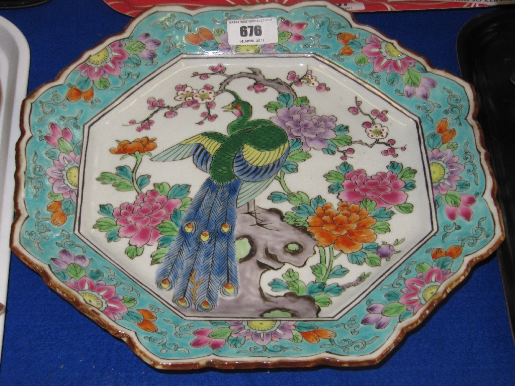 Appraisal: Oriental octagonal dish decorated with a central peacock surrounded by