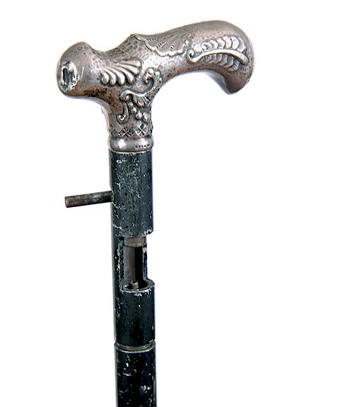 Appraisal: Sterling Gun Cane Ca - An ornate signed sterling handle