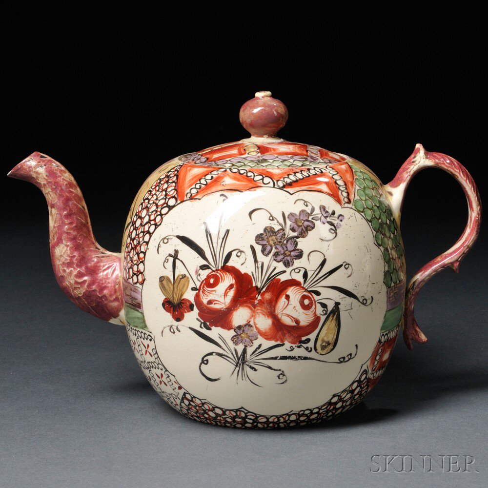 Appraisal: Staffordshire Cream-colored Earthenware Teapot and Cover England c globular with