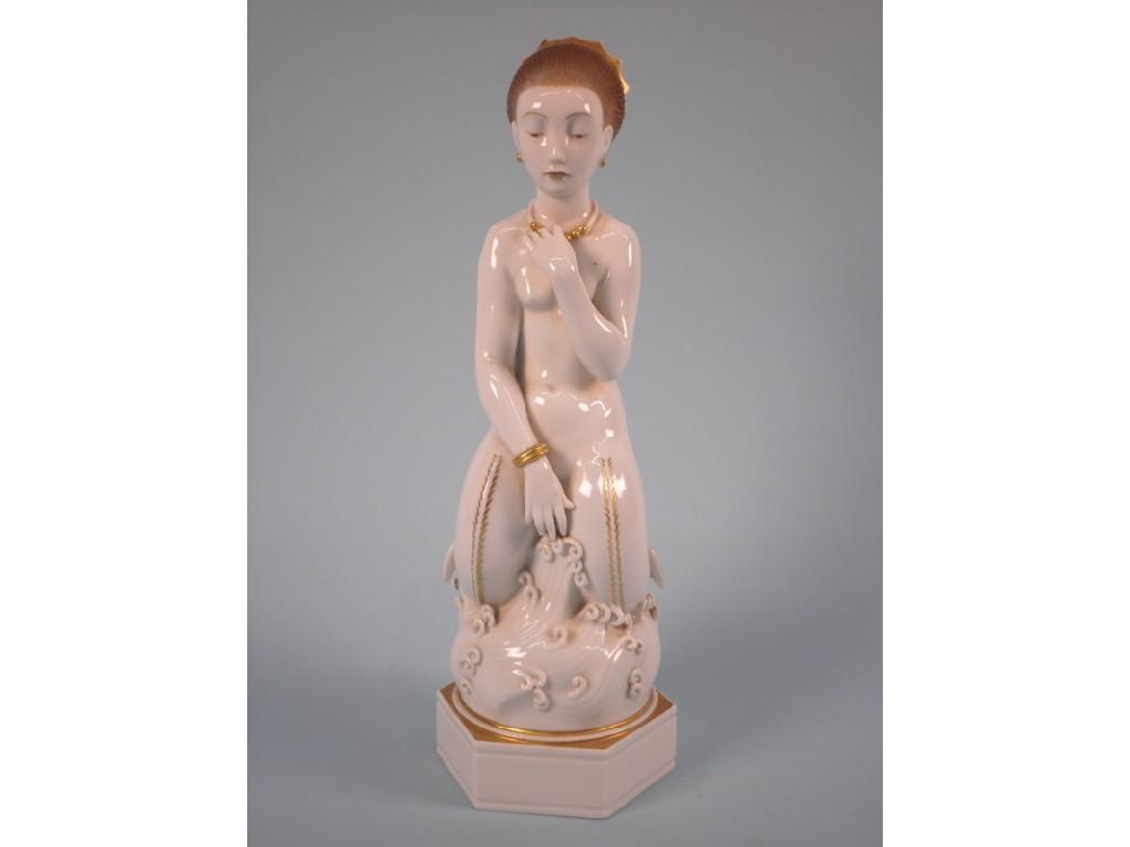 Appraisal: A Royal Copenhagen white and gold porcelain figure of a