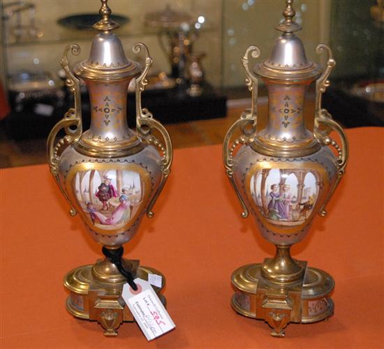 Appraisal: PAIR CONTINENTAL GARNITURES Silvered and gilt porcelain urns with Renaissance