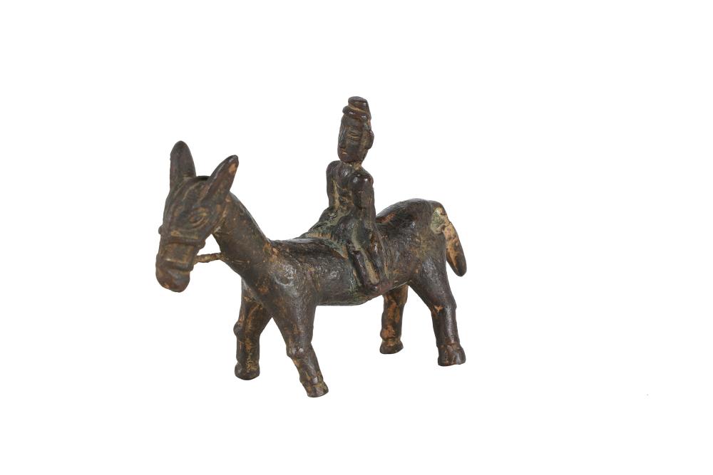 Appraisal: ARCHAIC BRONZE FIGURE ON DONKEYin a fitted case inches wide