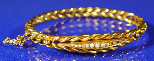 Appraisal: ct gold bangle with seed pearl inset