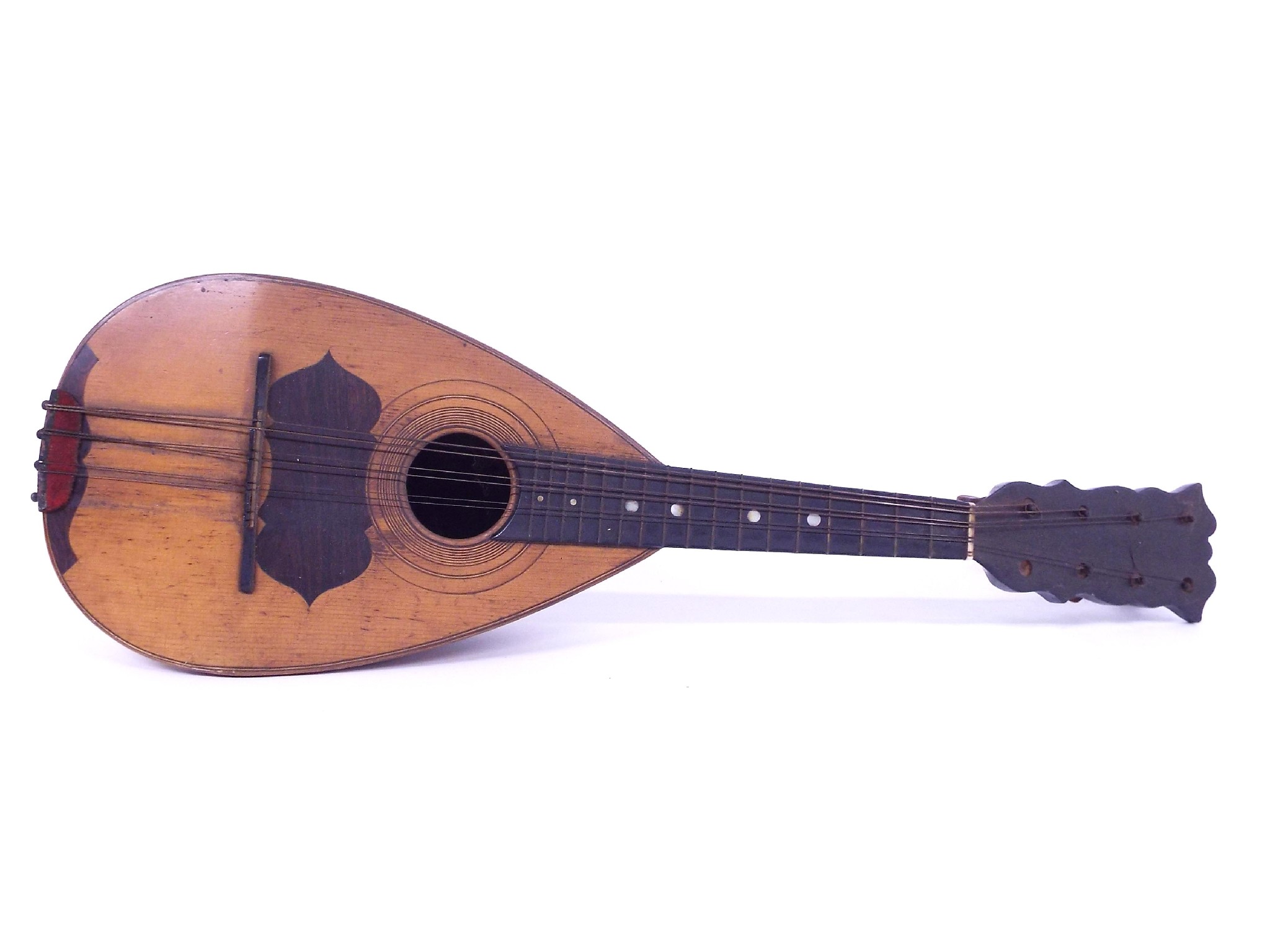 Appraisal: Interesting early bowl back mandolin with shaped closed peg box