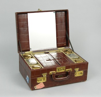 Appraisal: A Vintage Traveling Dressing Case A vintage traveling dressing case