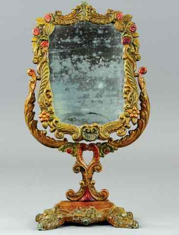 Appraisal: CAST IRON MIRROR ON STAND Very ornate casting effects floral